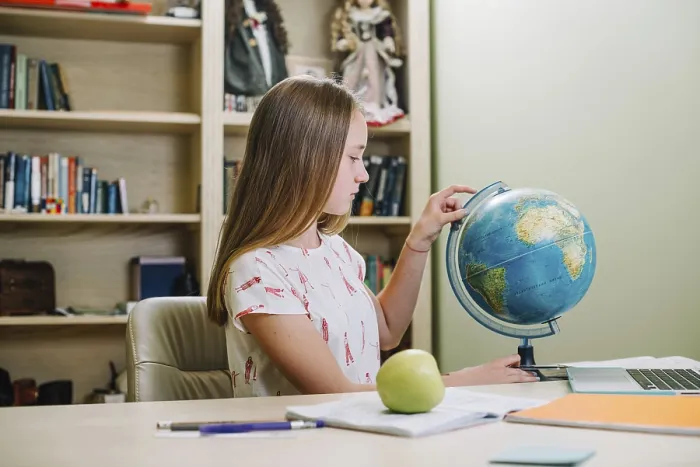 Framed Print : Student Posing with Globe Table Print Framed Print : Student Posing with Globe Table Print