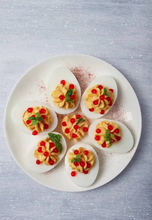 Framed Print : Stuffed eggs with red caviar print, close-up Framed Print : Stuffed eggs with red caviar print, close-up