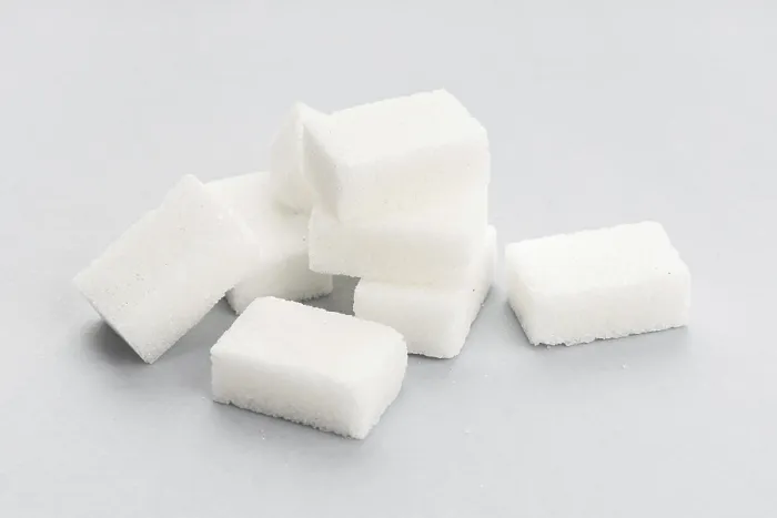 Framed Print : Close-up Sugar Cubes Print on Gray Background Framed Print : Close-up Sugar Cubes Print on Gray Background