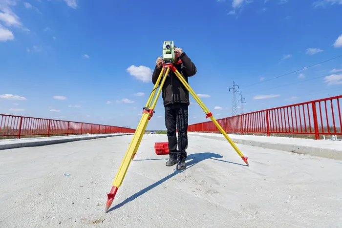Framed Print : Surveyor Engineer Measuring Bridge Print Framed Print : Surveyor Engineer Measuring Bridge Print