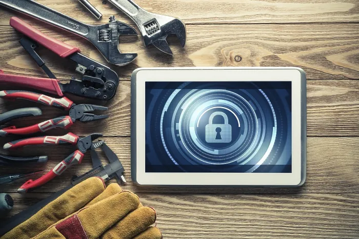 Framed Print : Tablet PC with Security Concept and Industrial Tools - Print Framed Print : Tablet PC with Security Concept and Industrial Tools - Print