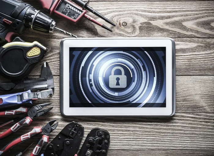 Framed Print : Tablet PC with Security Concept and Industrial Tools - Print Framed Print : Tablet PC with Security Concept and Industrial Tools - Print