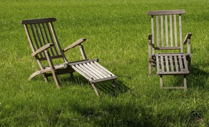 Framed Print : Two Teak Deck Chairs in a Meadow Print, Germany Framed Print : Two Teak Deck Chairs in a Meadow Print, Germany