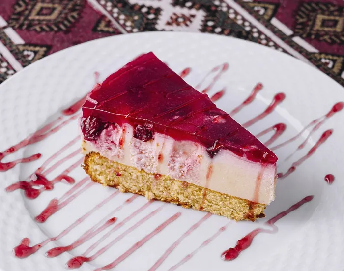 Framed Print : Raspberry Cheesecake Print on Patterned Tablecloth Framed Print : Raspberry Cheesecake Print on Patterned Tablecloth