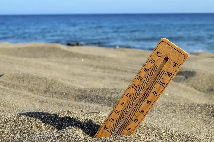Framed Print : Thermometer Print on a Beach Scene Framed Print : Thermometer Print on a Beach Scene
