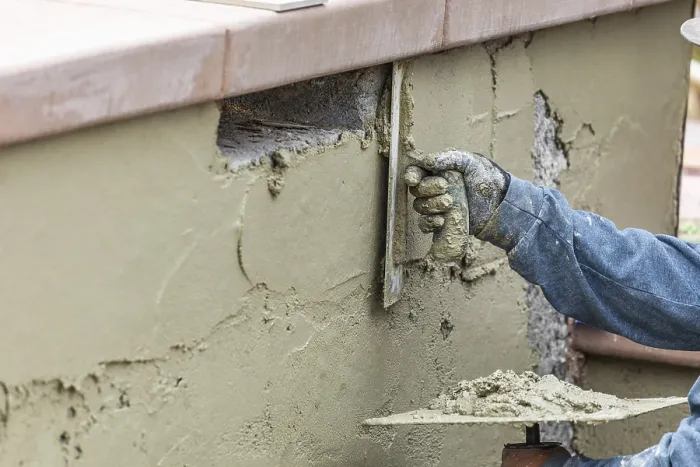 Framed Print : Tile Worker Applying Cement Print Framed Print : Tile Worker Applying Cement Print