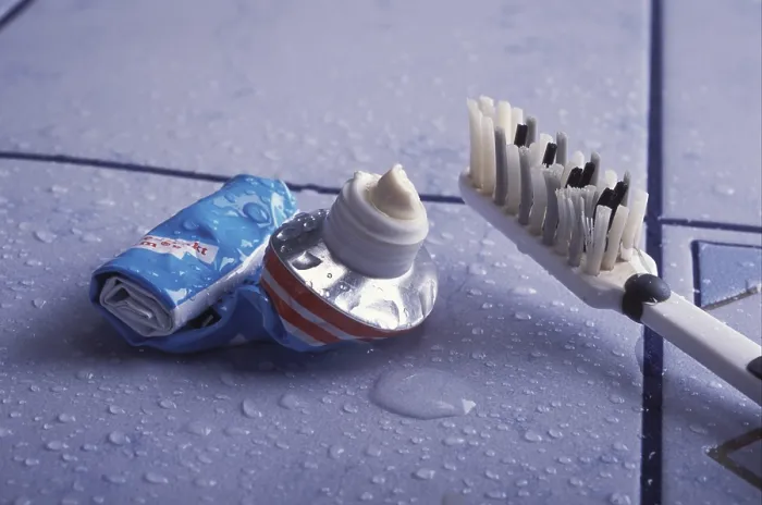Framed Print : Empty Toothpaste Tube and Used Toothbrush Print Framed Print : Empty Toothpaste Tube and Used Toothbrush Print