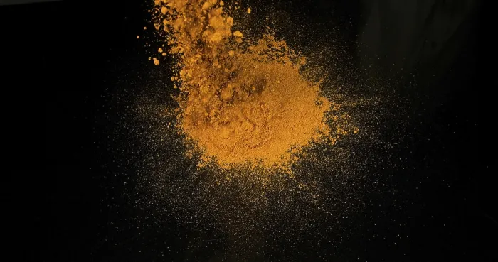 Framed Print : Turmeric Print: Exploding Powder against Black Background Framed Print : Turmeric Print: Exploding Powder against Black Background
