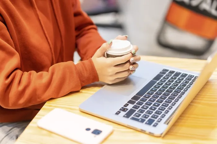 Framed Print : Unrecognizable Person with Coffee Reading Email Print Framed Print : Unrecognizable Person with Coffee Reading Email Print