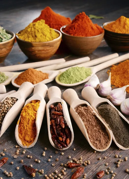 Framed Print : Variety of spices and herbs on kitchen table Print