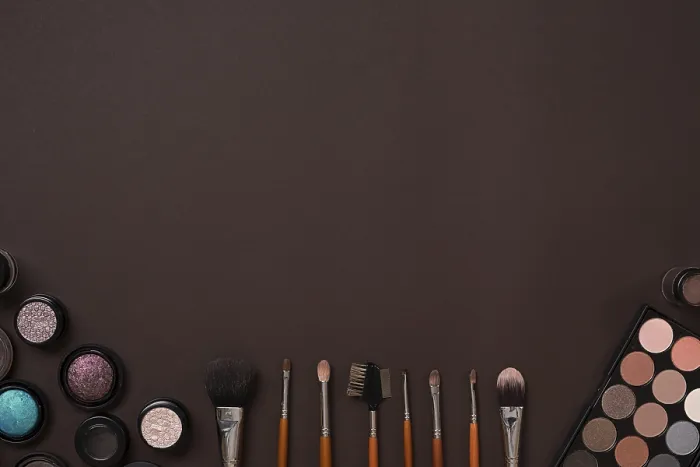 Framed Print : Cosmetics and Brushes Print on Brown Background Framed Print : Cosmetics and Brushes Print on Brown Background