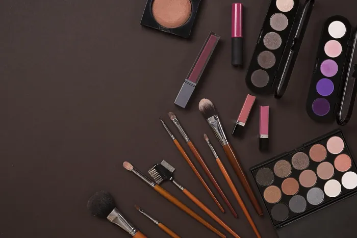 Framed Print : Cosmetics and Brushes Print on Brown Background Framed Print : Cosmetics and Brushes Print on Brown Background