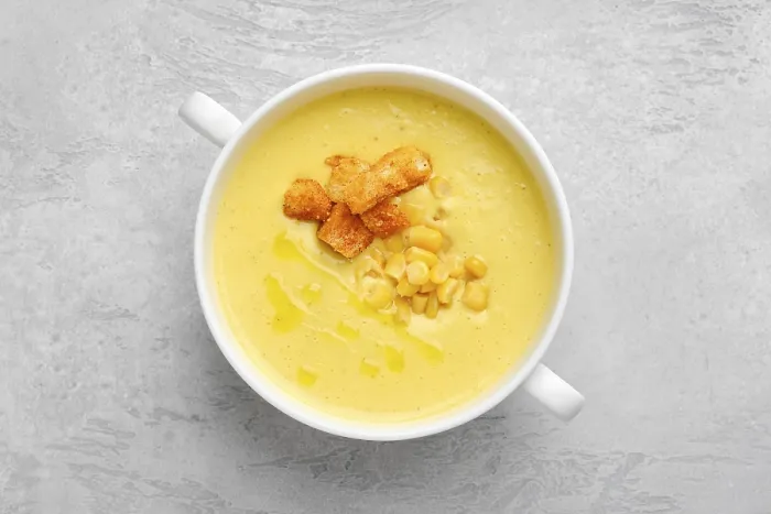 Framed Print : Top View of Mashed Corn Soup Puree with Croutons Print