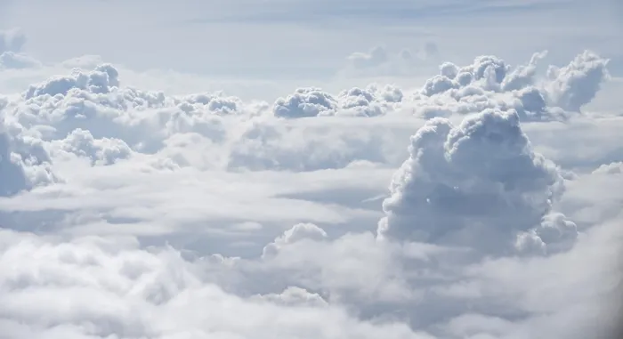 Framed Print : View over towering clouds Print - Aerial Plane Perspective Framed Print : View over towering clouds Print - Aerial Plane Perspective