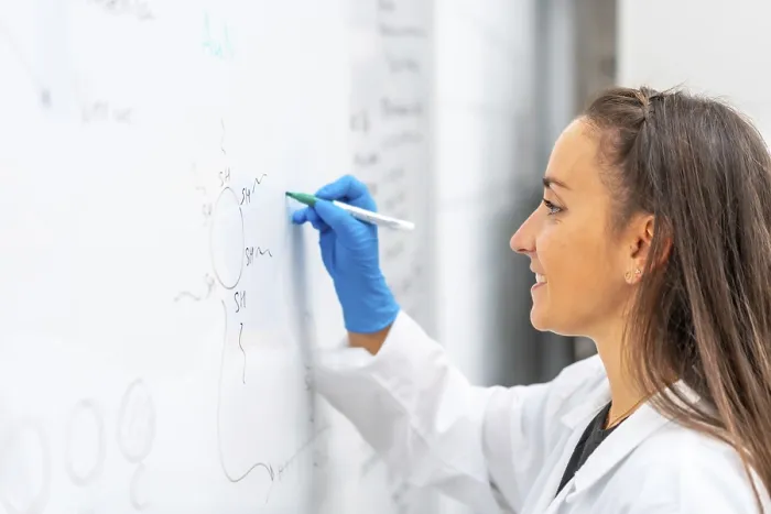 Framed Print : Young Female Biologist Writing Data in Lab Print Framed Print : Young Female Biologist Writing Data in Lab Print