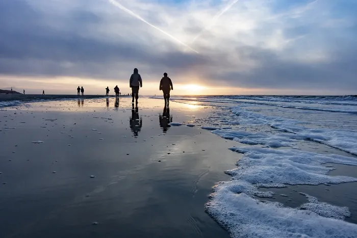 Framed Print : Walkers at Sunset on the Beach Print, Langeoog, Germany Framed Print : Walkers at Sunset on the Beach Print, Langeoog, Germany