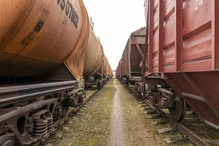 Framed Print : Walking between Two Cargo Trains Print Framed Print : Walking between Two Cargo Trains Print