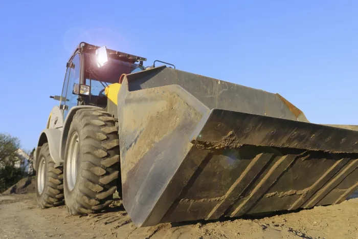 Framed Print : Wheel loader at sunset in Mutterstadt Print