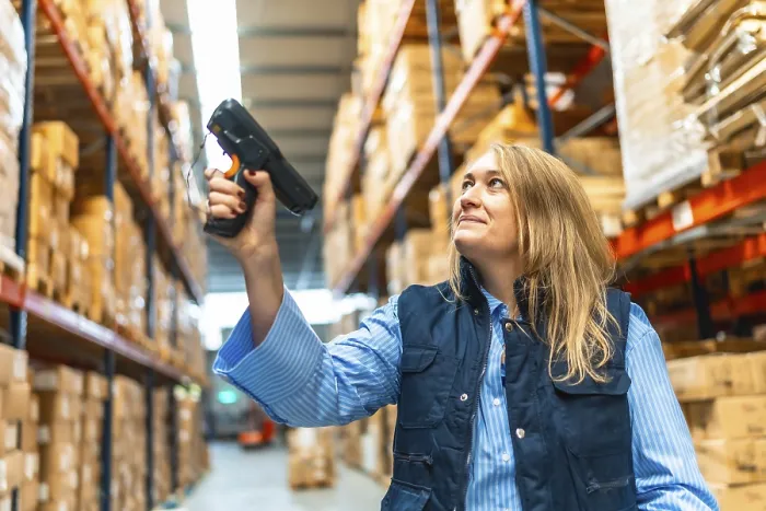 Framed Print : Woman Scanning Package in Warehouse Print Framed Print : Woman Scanning Package in Warehouse Print