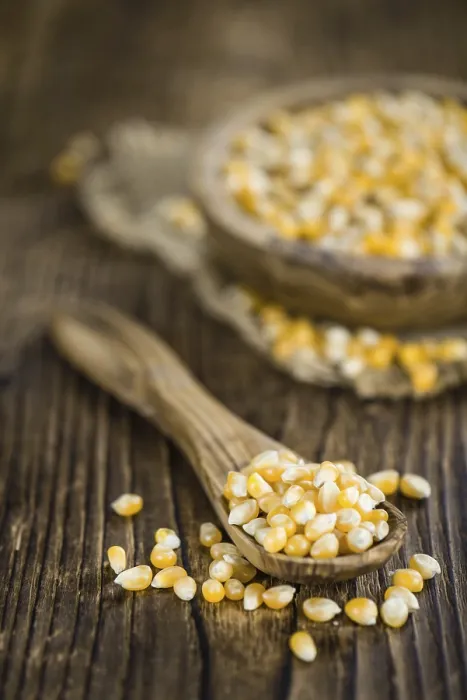 Framed Print : Wooden Table with Corn Print - Close-Up Framed Print : Wooden Table with Corn Print - Close-Up
