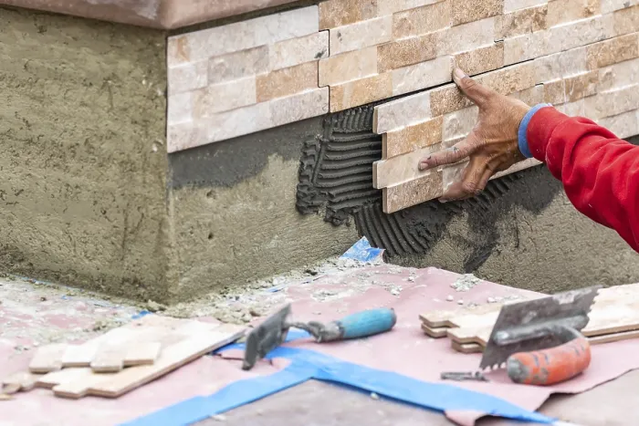Framed Print : Worker Installing Wall Tile Print Framed Print : Worker Installing Wall Tile Print