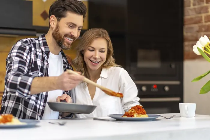 Framed Print : Young Couple Having Breakfast in Kitchen Print Framed Print : Young Couple Having Breakfast in Kitchen Print