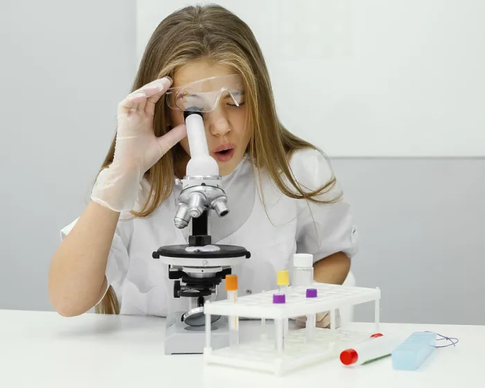 Framed Print : Young Girl Scientist Using Microscope Print Framed Print : Young Girl Scientist Using Microscope Print