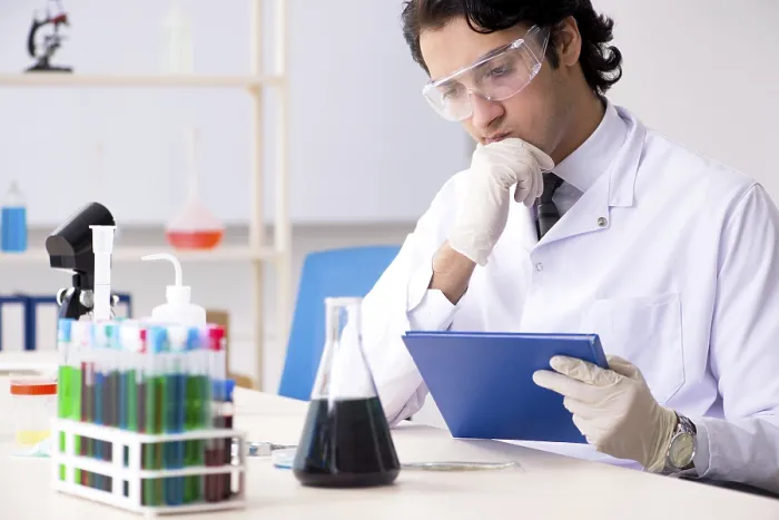Framed Print : Young Chemist Working in Lab Print Framed Print : Young Chemist Working in Lab Print