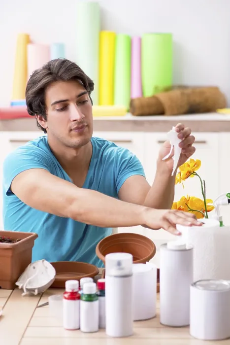 Framed Print : Young Man Decorating Pottery Print Framed Print : Young Man Decorating Pottery Print