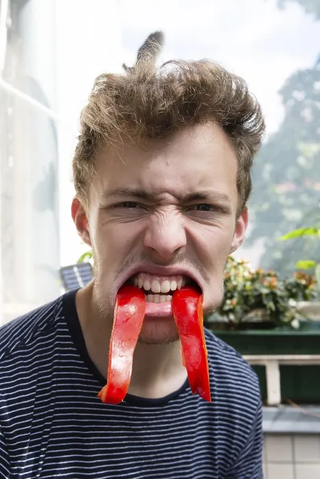 Framed Print : Young Man with Pepper Vampire Teeth Print Framed Print : Young Man with Pepper Vampire Teeth Print