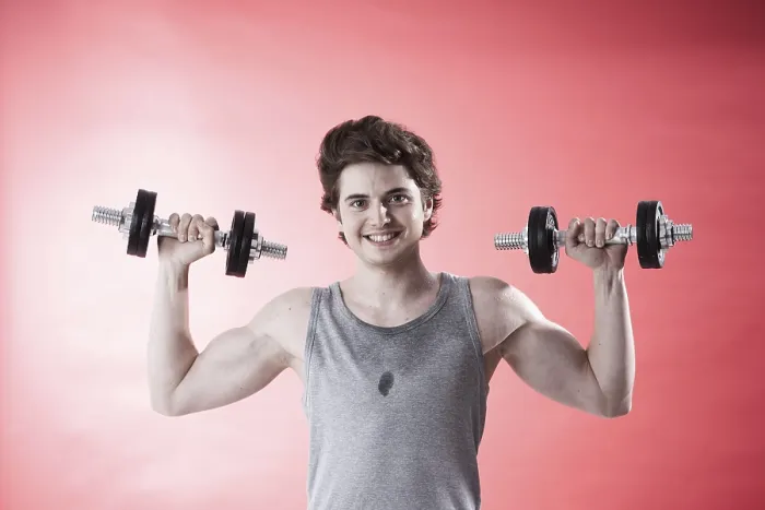 Framed Print : Young Man Using Dumbbells During Strength Training Print Framed Print : Young Man Using Dumbbells During Strength Training Print