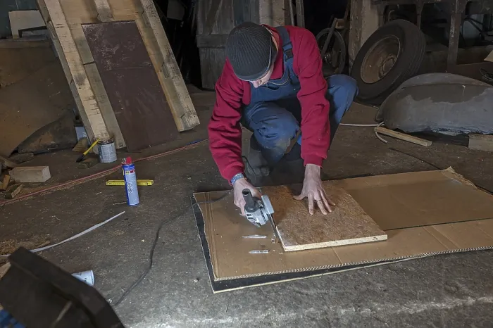 Framed Print : Young Man Working with Angle Grinder Print, Germany Framed Print : Young Man Working with Angle Grinder Print, Germany