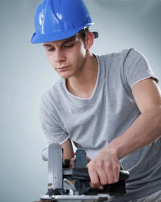 Framed Print : Young Tradesman Using a Jigsaw Print Framed Print : Young Tradesman Using a Jigsaw Print