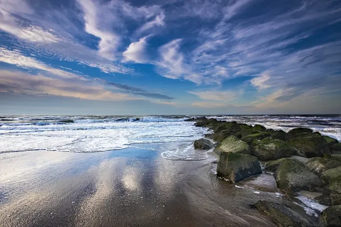 Framed Print : Print of Breakers on North Sea Beach with Coastal Defense by Breakwaters