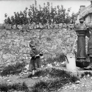 Print of two children at a water pump in Cheddar, Somerset