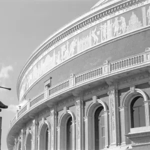 Print of The Royal Albert Hall, featuring a decorative frieze and statue Print of The Royal Albert Hall, featuring a decorative frieze and statue