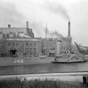 Print of a Paddle Steamer under Arms, Deptford Creek, London Print of a Paddle Steamer under Arms, Deptford Creek, London