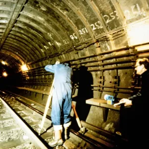Print of Two Men Surveying an Underground Railway Tunnel Print of Two Men Surveying an Underground Railway Tunnel