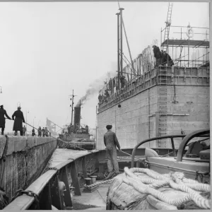 Print of a concrete caisson being maneuvered in Tilbury Docks Print of a concrete caisson being maneuvered in Tilbury Docks