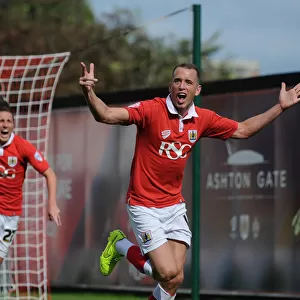 Aaron Wilbraham's Thrilling Goal Celebration: A Memorable Moment at Ashton Gate, Bristol City vs Colchester United, Sky Bet League One, 2014