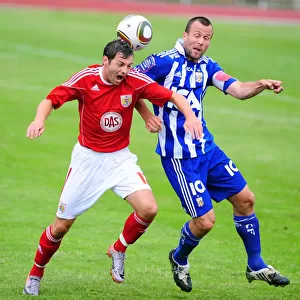 Bristol Citys Ivan Sproule battles for the ball