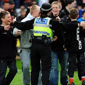 Jubilant Blackpool Fans Celebrate Promotion with Police after Winning Championship Game vs. Bristol City (02/05/2010)