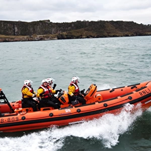 Teignmouth Atlantic 85 inshore lifeboat the Two Annes B-809 moving from left to right, four crew onboard