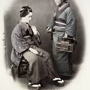 1860s Japan - portrait of a young woman with a pipe Felice or Felix Beato