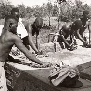 1940s East Africa - askari soldiers washing clothes
