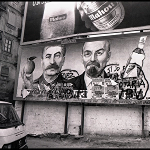 Advertising hoarding with grafitti, Valencia, Spain