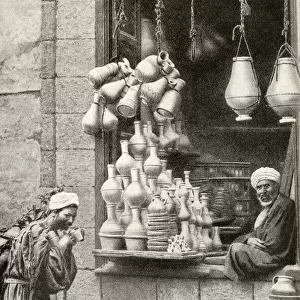 Arab pottery shop and shopkeeper, Cairo, Egypt