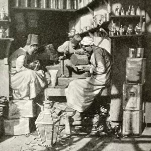 Arab tinsmiths at work in a shop, Cairo, Egypt