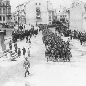 Austrian troops marching through a town, Romania, WW1