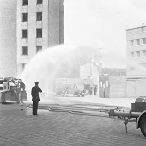Auxiliary firefighters at drill, Lambeth HQ, WW2